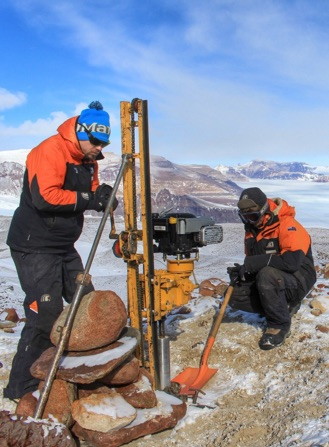 Two people surveying a landscape